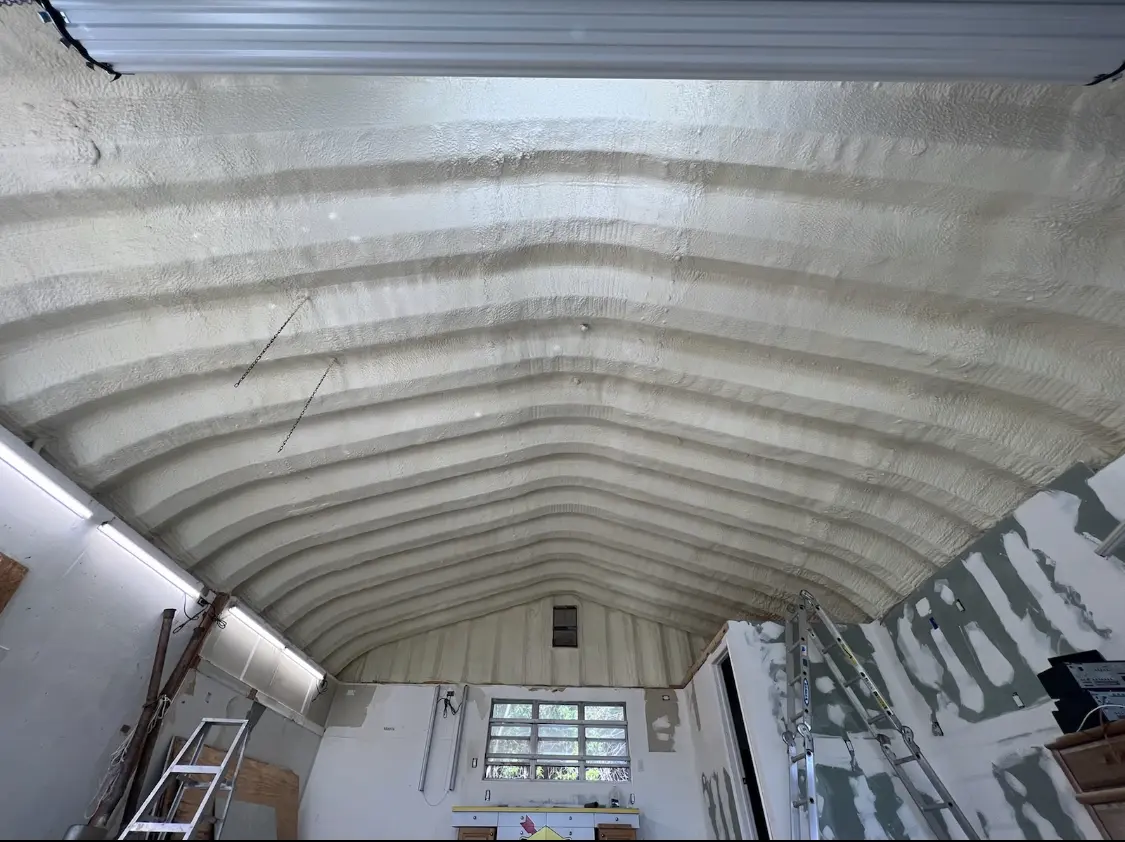 Spray polyurethane foam applied to the underside of a metal roof deck in Pebble Creek